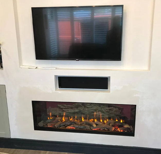 Media wall with an inset electric fire, installed by Fire Flair Direct