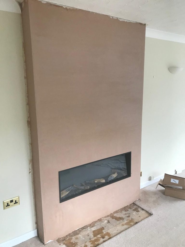 Linear gas fire in a plastered chimney breast, installed by Fire Flair Direct